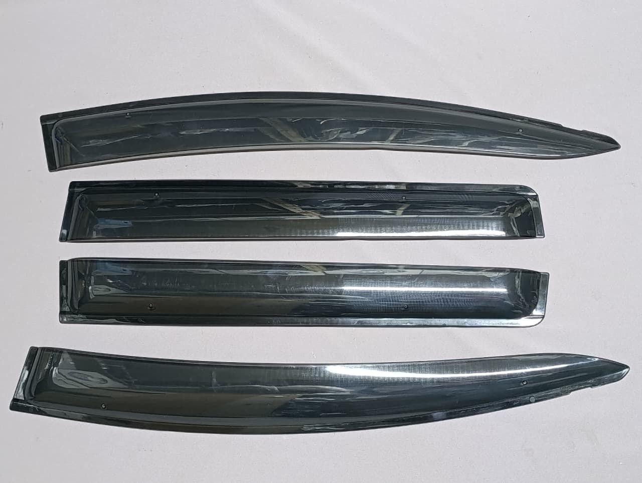 f69c1842-49d1-40c8-a32c-8ae406123595 Original Windbreaker Toyota Ractis - Image 1